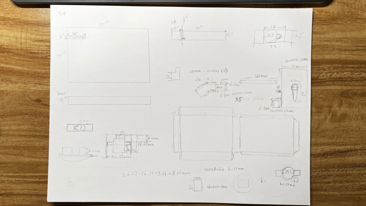 the working sheet — the enclosure in inches, the mechanism in millimetres, and the arithmetic in the middle getting from measured parts down to a clearance of 8.22mm